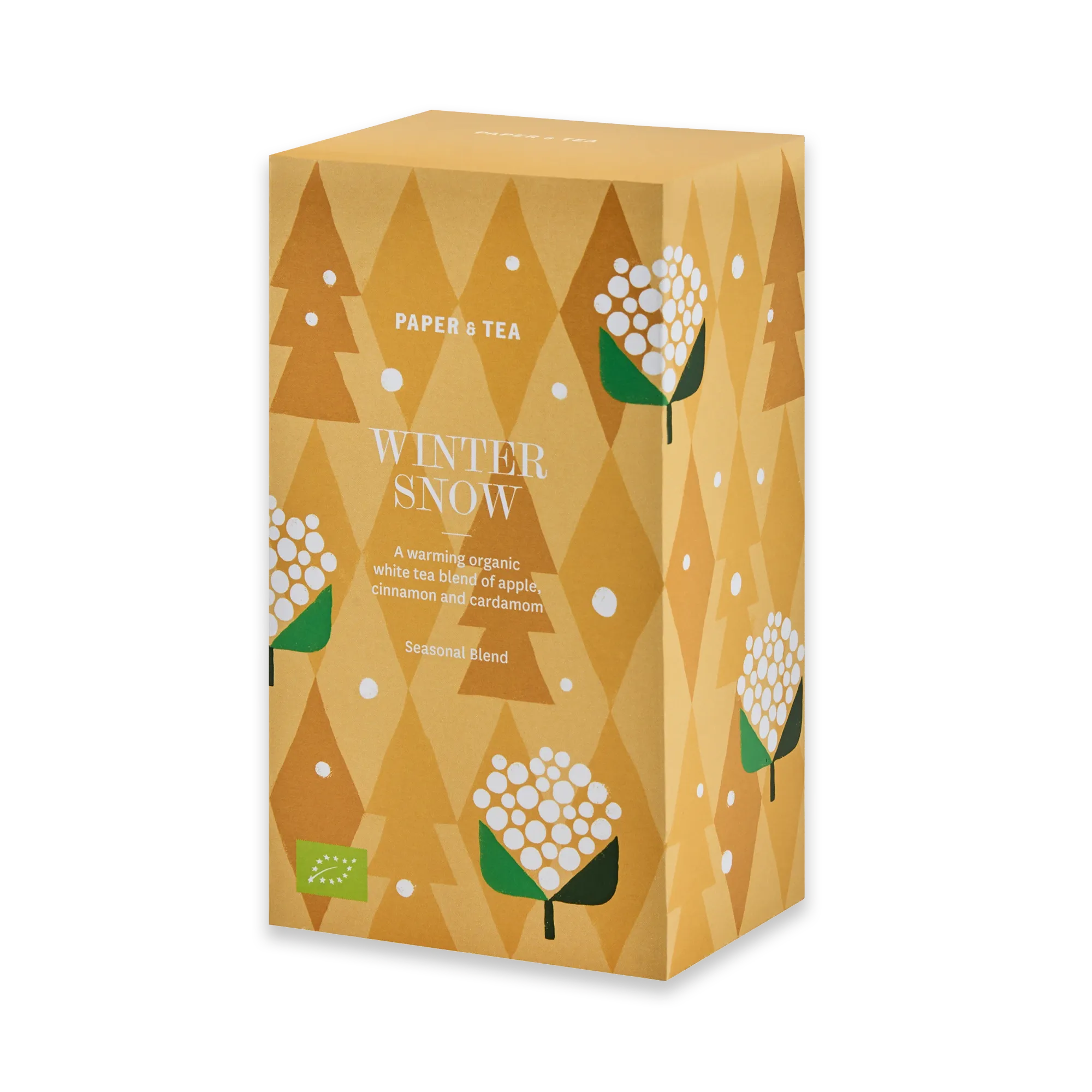 Rechteckige Teeverpackung von PAPER & TEA mit gelb-orangefarbenem Wintermotiv aus Zapfen und Beeren.